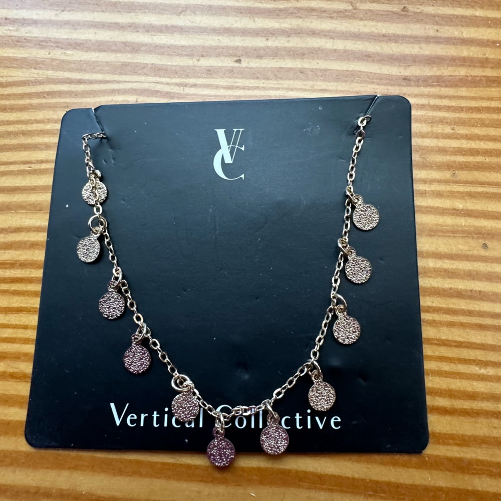 Vertical Collective Dalia coin bracelet gold plate. New never worn.